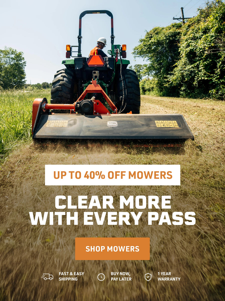 Titan mower attachment cutting tall grass behind a tractor